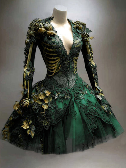 Green version of the long-sleeved lace and tulle dress on a mannequin, trimmed with gold skeleton details and roses. 4