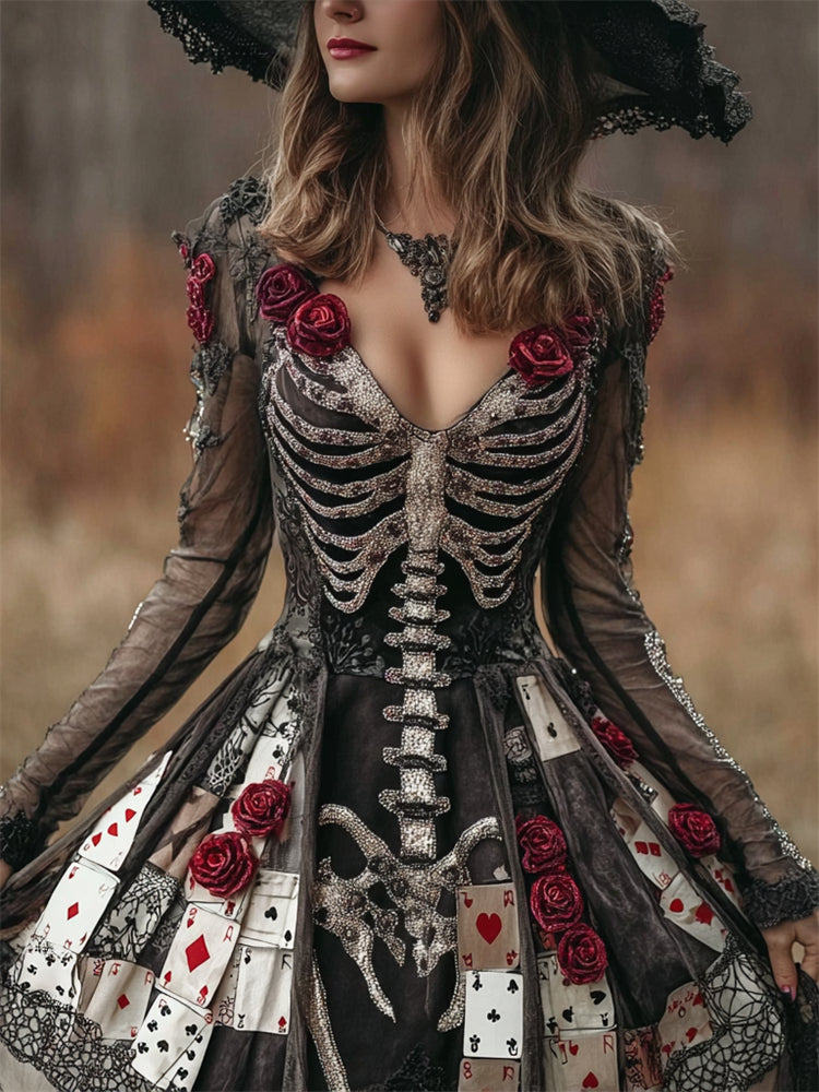 Model in a wide-brimmed lace hat wearing the dress, showing its sheer sleeves, beaded rib cage and playing card skirt 1