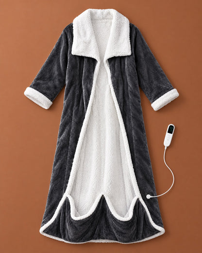Flat lay of the open charcoal fleece robe with white sherpa collar, cuffs and lining, plus its white heat controller on a rust background. 1