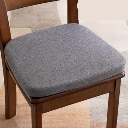 Dark grey woven-fabric seat cushion with rounded corners, placed on a dark wooden dining chair 3