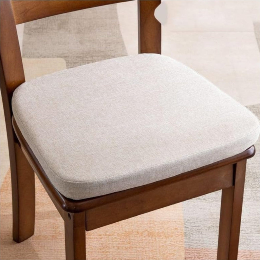 Cream woven-fabric seat cushion with rounded corners, sitting on a dark wooden dining chair 4