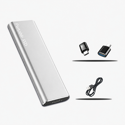 Silver slim drive pictured with two black adapters and a black USB cable beside it 4