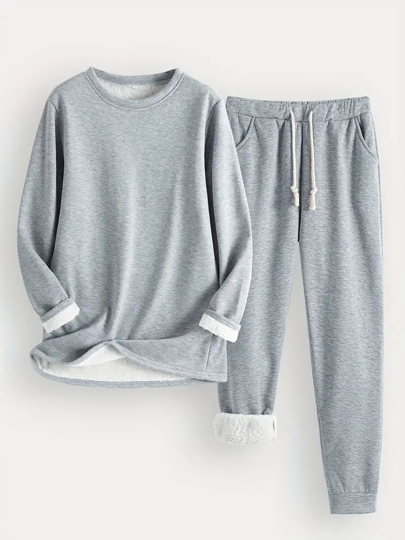 Flat lay of the set in light heather grey, showing fleece-lined cuffs and a drawstring waist 7