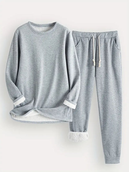 Flat lay of the set in light heather grey, showing fleece-lined cuffs and a drawstring waist 7