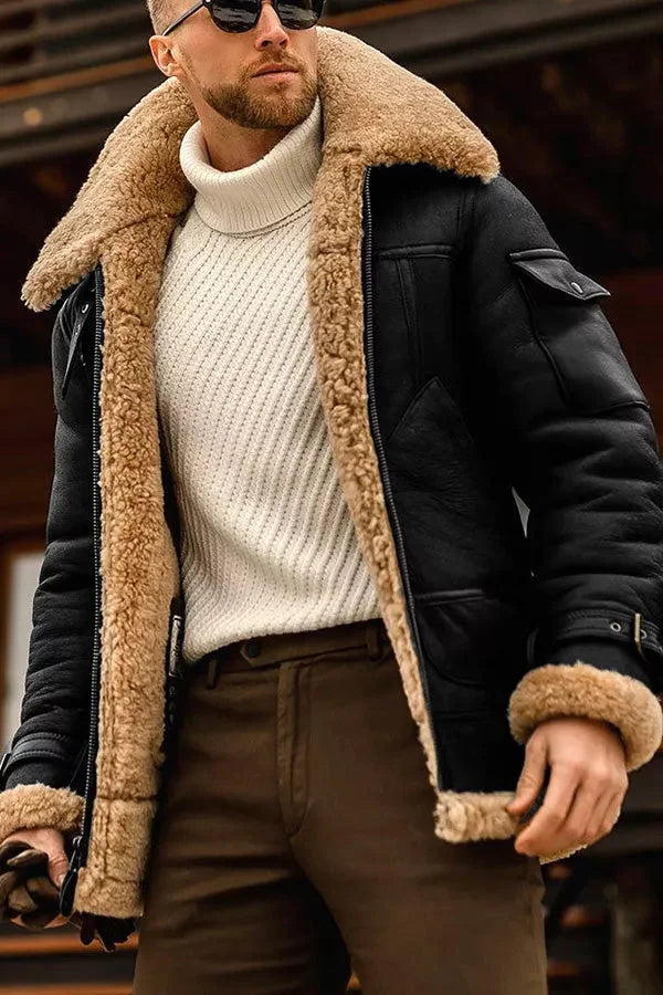 Black version of the jacket worn open, showing the zip, chest pocket and fleece-lined collar 5