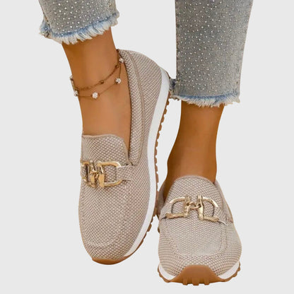 Beige mesh loafers with gold buckle, worn front-on with an ankle chain and studded jeans 2