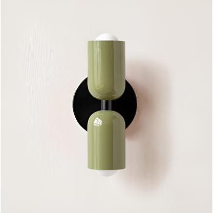 Wall light with both heads in olive green on a round black backplate. 25