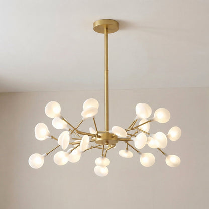 Smaller gold chandelier with fewer glowing frosted orbs, hanging on a brass-toned rod from a round ceiling plate 7