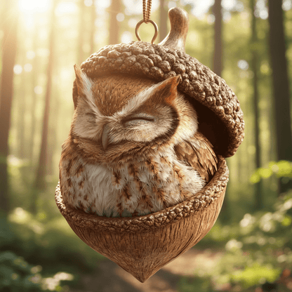 Sleeping owl in a hanging acorn with a gold hook and cord, in sunlit woodland 6