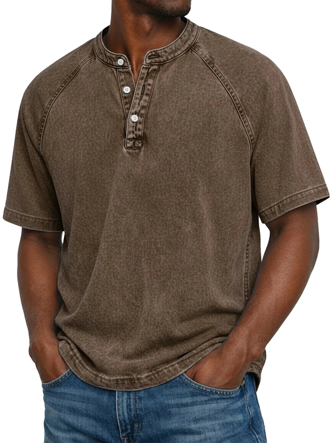Model wearing the short-sleeved raglan Henley in a washed coffee brown, showing the faded finish and three-button placket. 8
