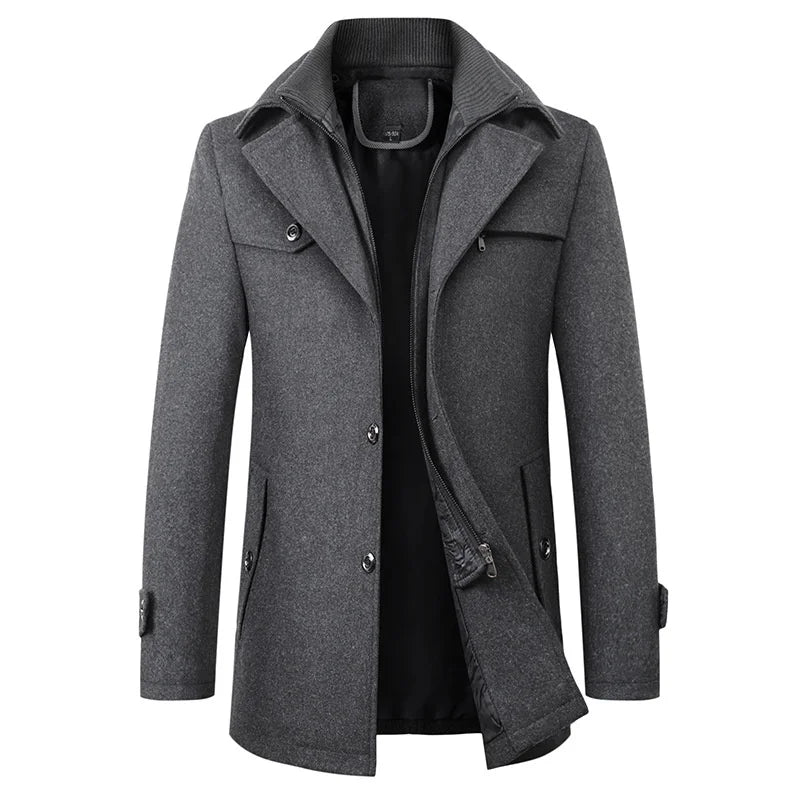 Front view of the grey version, showing the notched lapels, buttoned placket, flap pockets and the knitted collar of the inner layer. 2