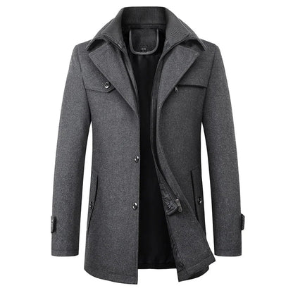 Front view of the grey version, showing the notched lapels, buttoned placket, flap pockets and the knitted collar of the inner layer. 2