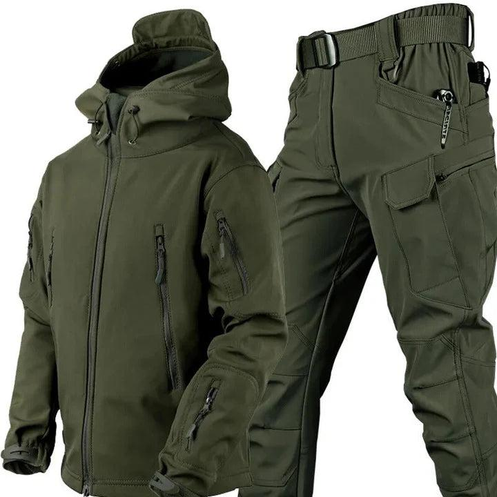 Olive green hooded zip jacket with sleeve pockets beside matching cargo trousers with belt and large thigh pocket. 1