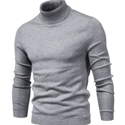 Front view of the knitted turtleneck jumper in light grey, with ribbed collar, cuffs and hem 1