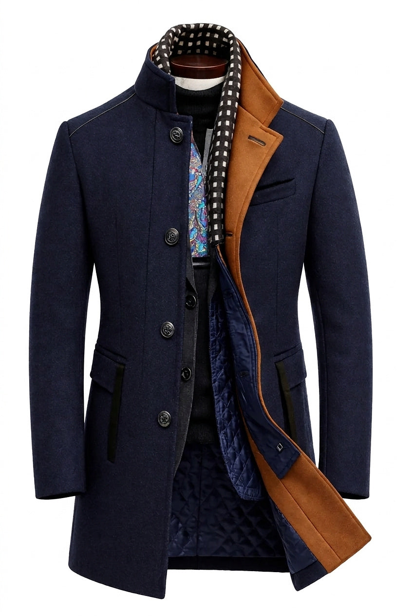 Navy coat on a mannequin, front open to show the quilted lining, tan inner collar and checked scarf 1