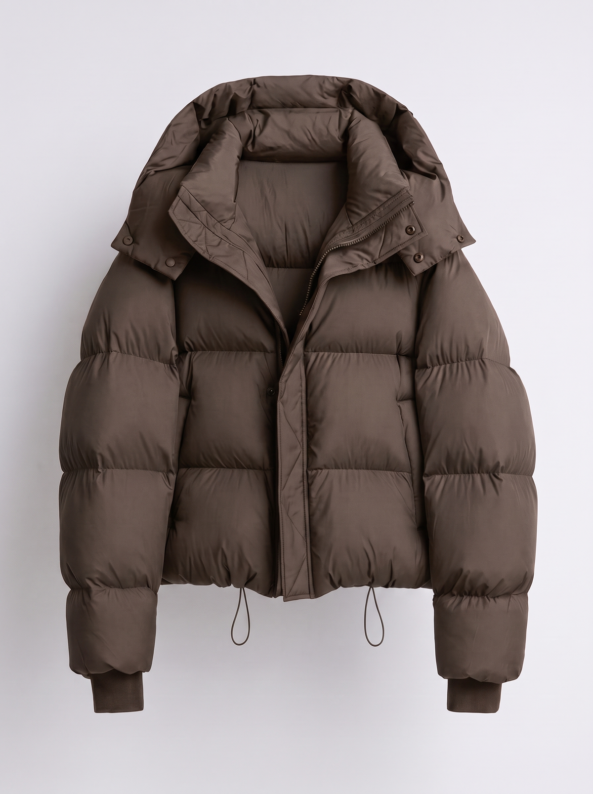 Dark brown quilted puffer jacket laid flat, front view, showing the hood, zip and drawcord hem 2