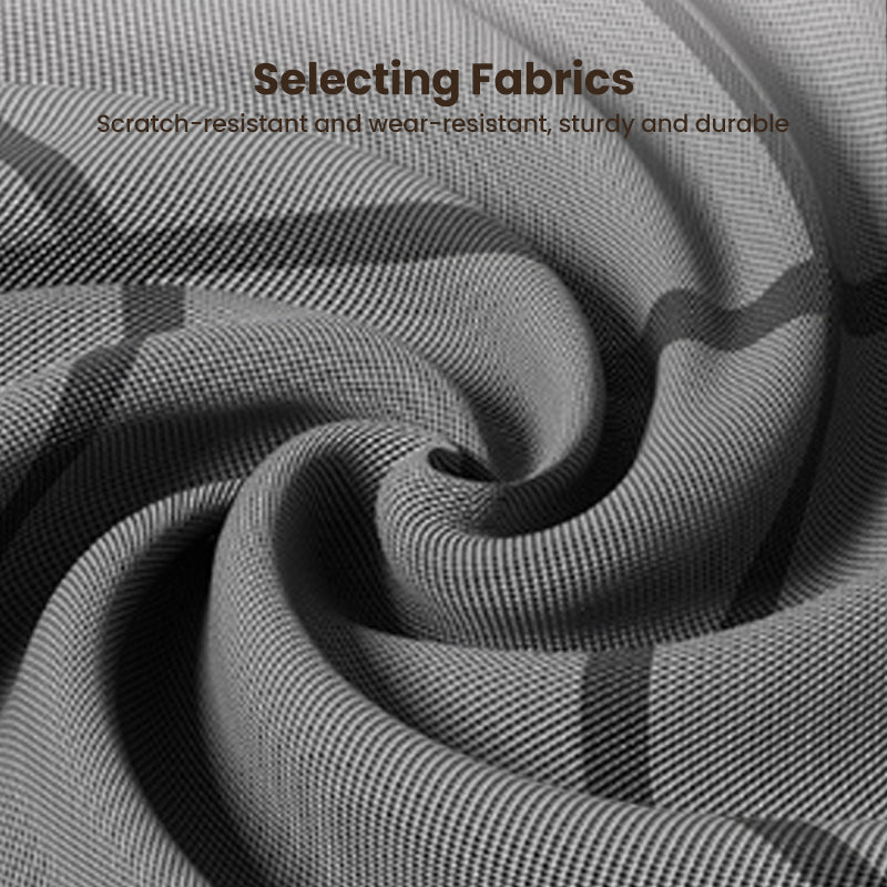 Close-up of the grey woven fabric swirled in folds, showing the fine texture and dark grid stripe. 10