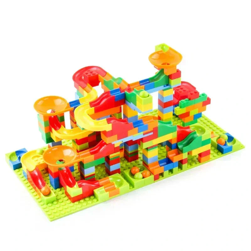 Wide, multi-level marble run in bright mixed colours on a lime-green baseplate, with several balls waiting in collecting cups. 4