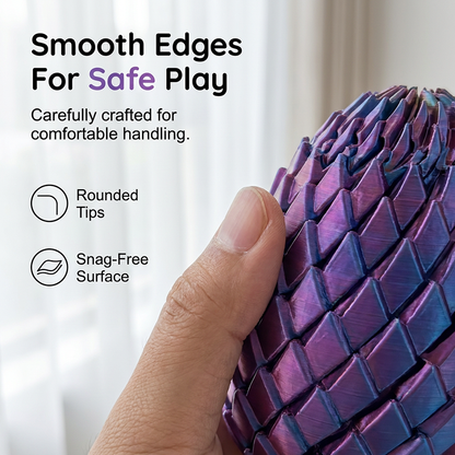 Close-up of a thumb pressed against the purple scaled surface, showing the rounded scale tips and smooth edges. 3
