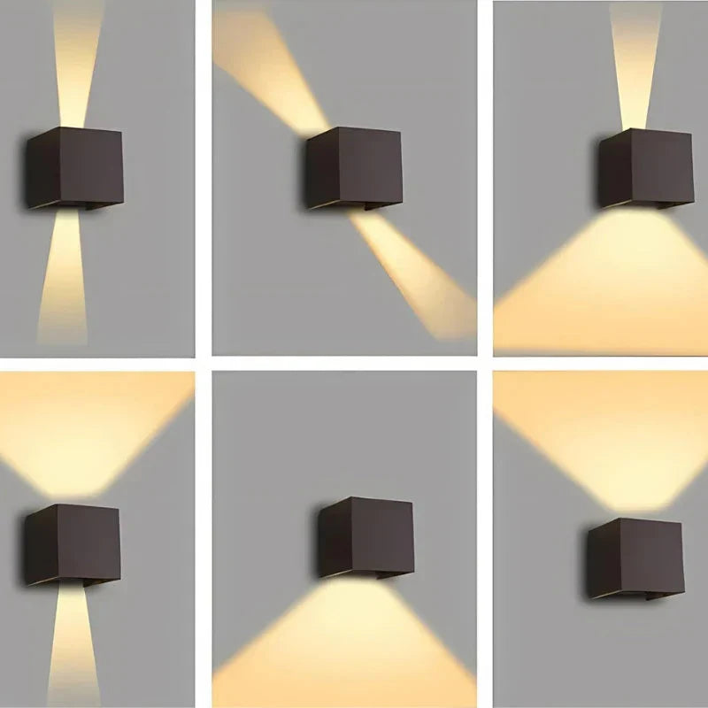 Six panels showing a dark cube wall lamp with different beam settings: narrow, angled, upward only, downward only and wide spreads. 14