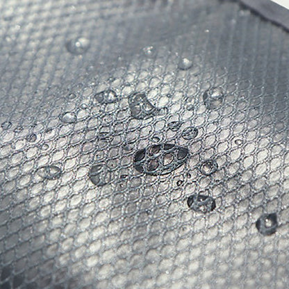 Close-up of grey mesh fabric with water droplets beading on the surface, showing its water-resistant finish. 5