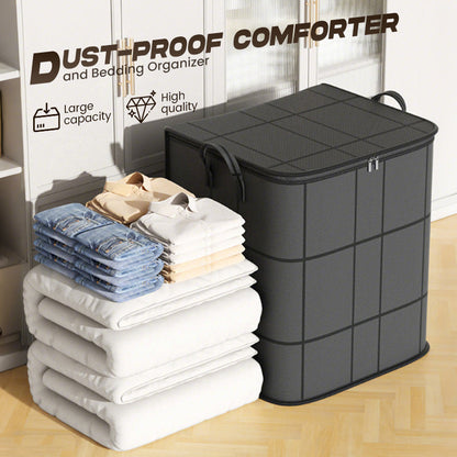 Dark storage bag next to stacked quilts, folded jeans and shirts in front of white cabinets, shown as a bedding organiser. 6