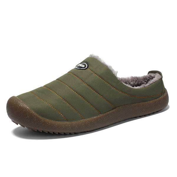 Single olive green quilted slipper with fleece lining and brown sole on white background 14