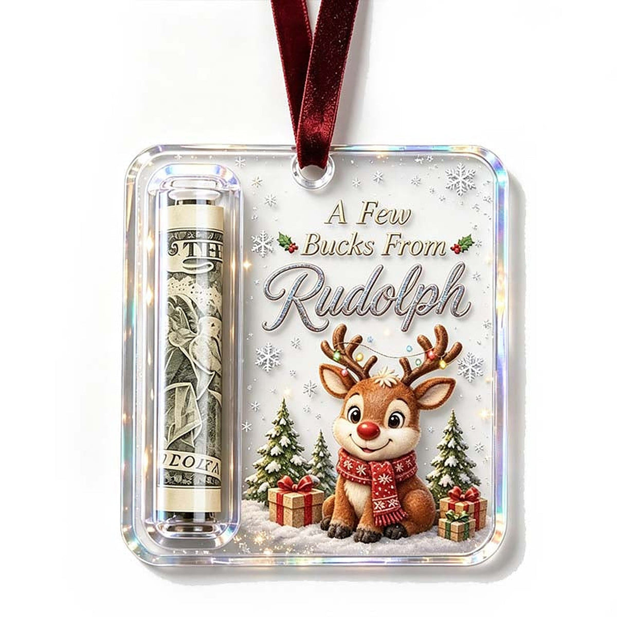 Ornament with a cute reindeer in a red scarf beside gifts and fir trees, with a rolled note in the side tube. 17