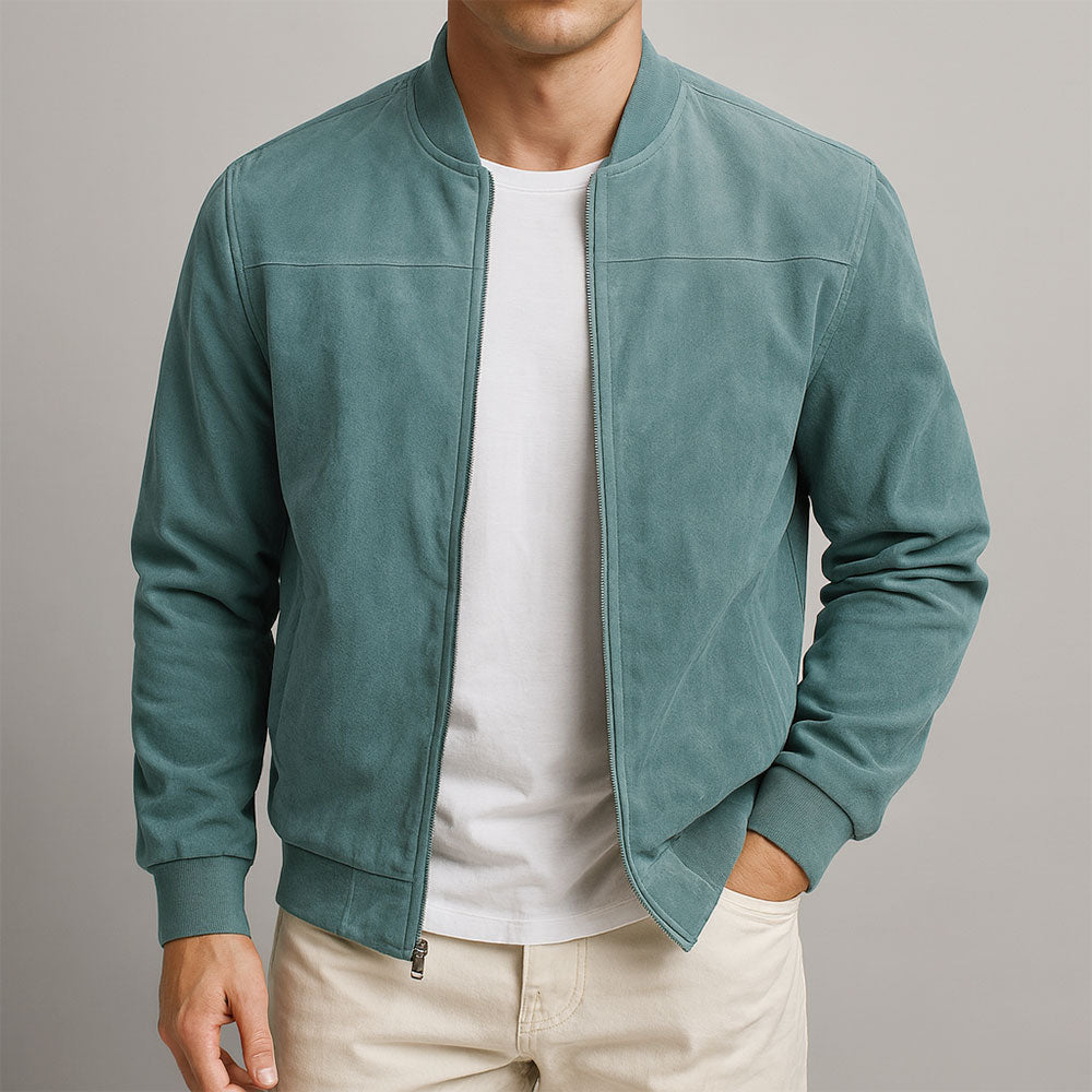 Front view of the jacket in teal, worn open over a white t-shirt with ribbed collar and cuffs. 2