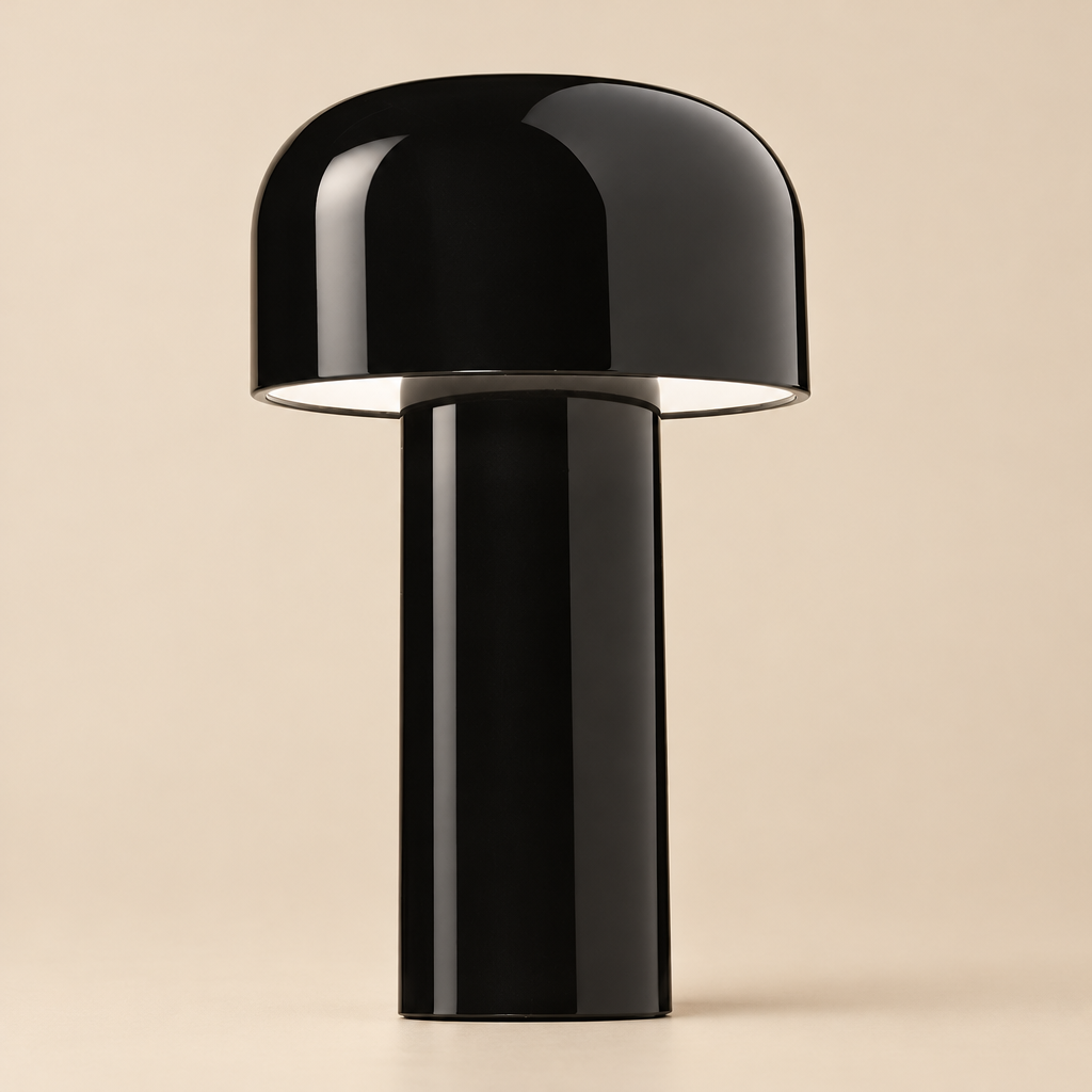 Close view of the glossy black lamp, its domed shade and cylindrical stem against beige 33