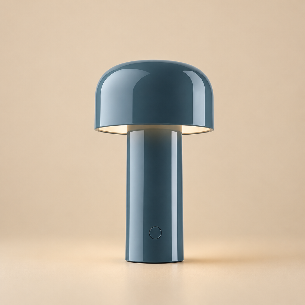 Glossy blue-grey lamp lit against a beige backdrop, with a round button low on the stem 30