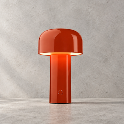 Glossy orange-red lamp glowing under its dome, with a round touch button on the stem 29