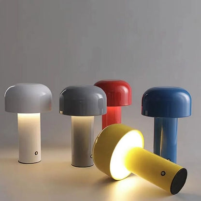 Five mushroom lamps in white, grey, red and blue, with a yellow one lying on its side, glowing 18