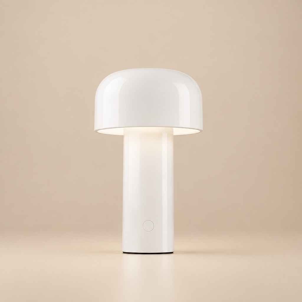 White glossy mushroom lamp lit against a beige backdrop, with a round button on the stem 28