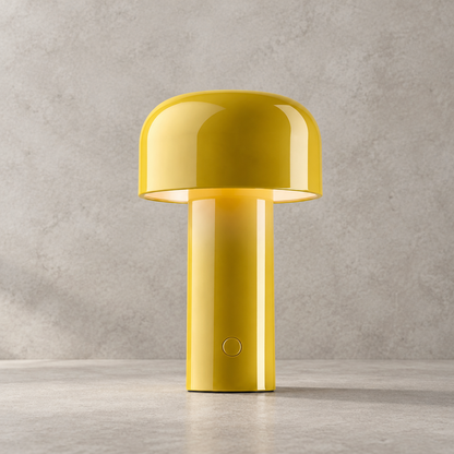 Glossy yellow lamp with domed shade, softly lit, round touch button visible on the stem 31
