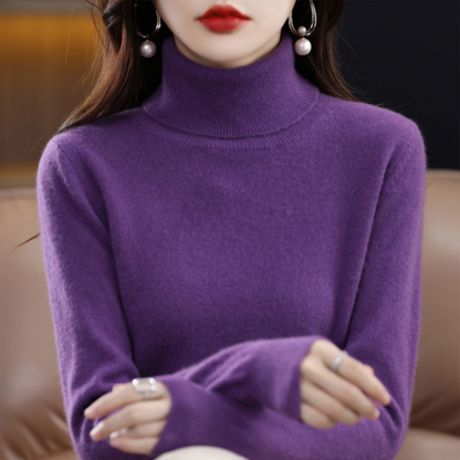Deep purple roll-neck jumper on a model with folded arms, showing the ribbed collar and cuffs and smooth fitted sleeves. 5