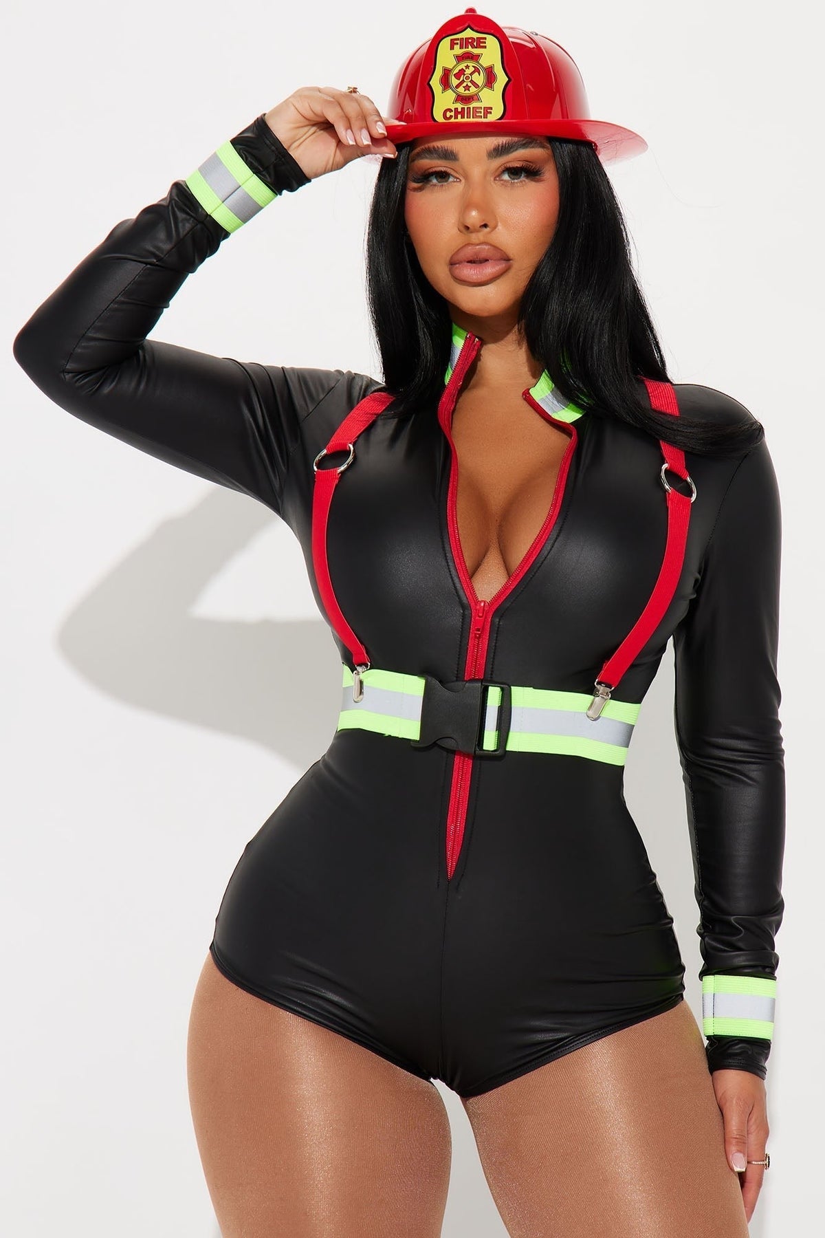 Close front view of a model touching the red helmet brim, showing zip, red braces and buckled reflective belt 2