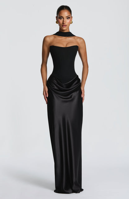 Front view of black strapless corset maxi dress with satin cowl skirt and matching neck scarf 20