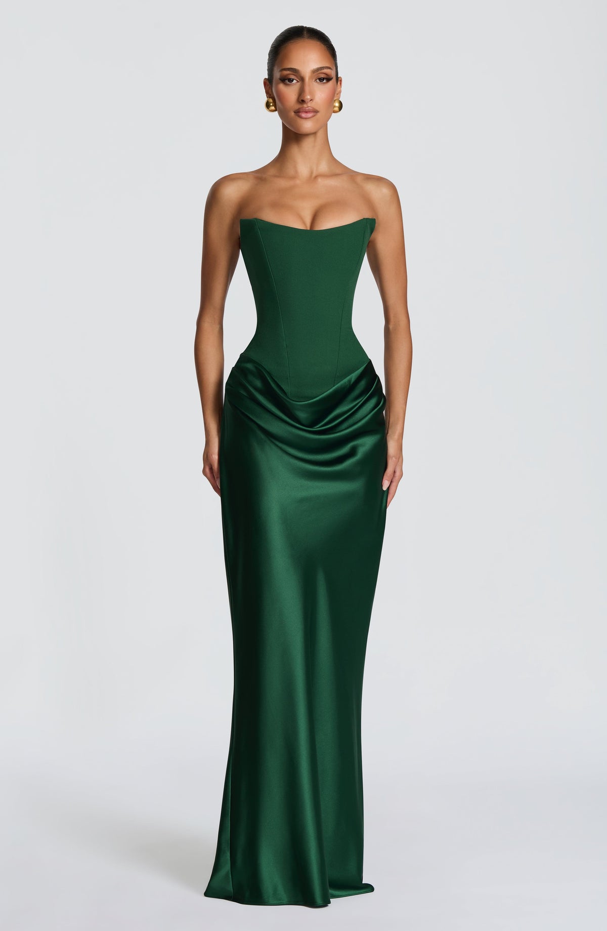 Dark green strapless corset maxi dress with satin cowl skirt, model facing front 29