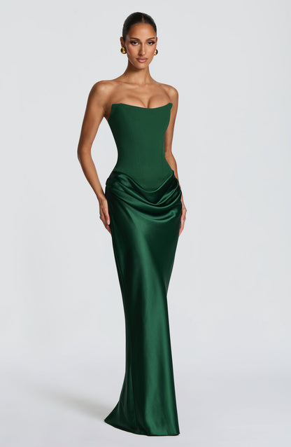 Green strapless corset maxi dress shown at an angle, highlighting the sheen of the satin skirt 32
