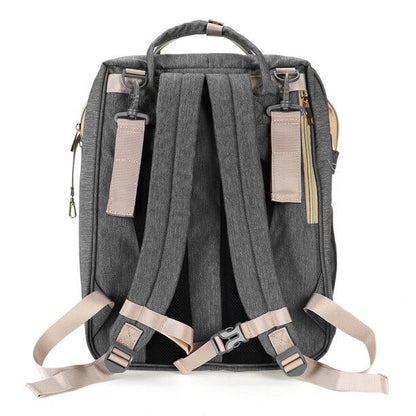 Convertible baby-changing backpack with fold-out baby bed – waterproof, multi-pocket design