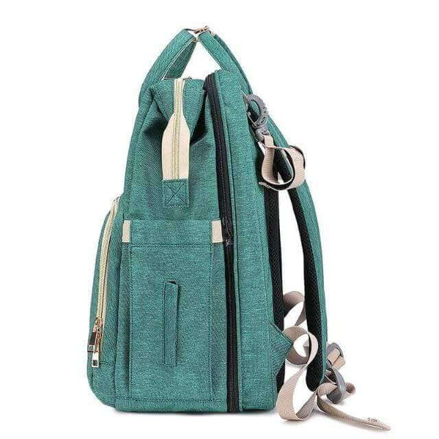 Convertible baby-changing backpack with fold-out baby bed – waterproof, multi-pocket design