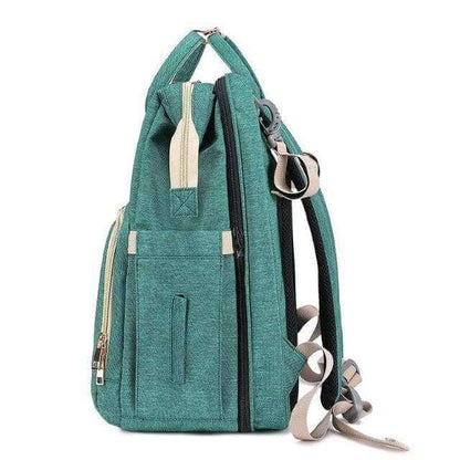 Convertible baby-changing backpack with fold-out baby bed – waterproof, multi-pocket design