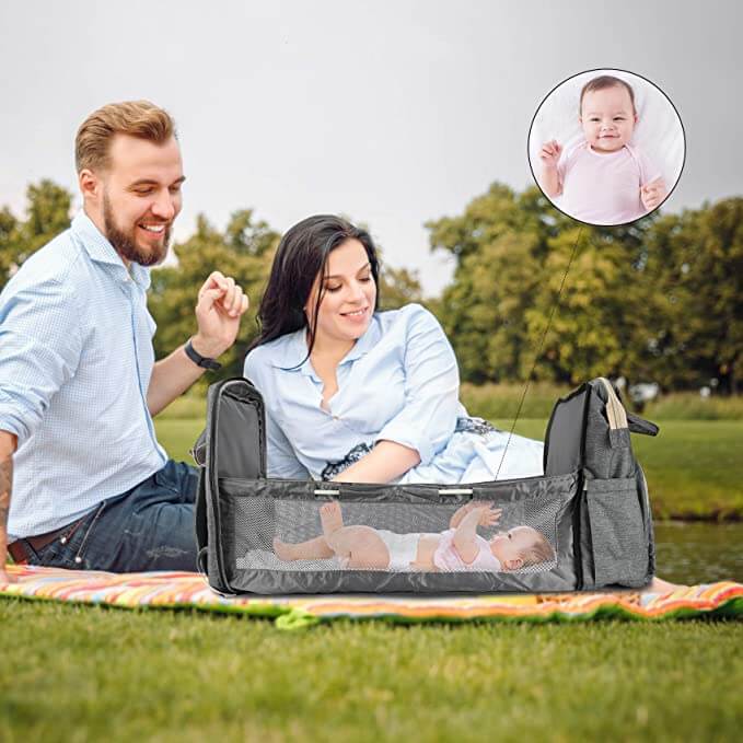 Convertible baby-changing backpack with fold-out baby bed – waterproof, multi-pocket design