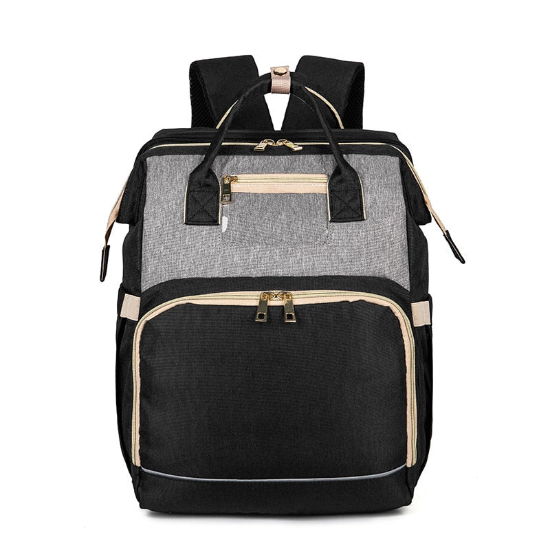 Convertible baby-changing backpack with fold-out baby bed – waterproof, multi-pocket design