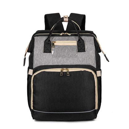 Convertible baby-changing backpack with fold-out baby bed – waterproof, multi-pocket design