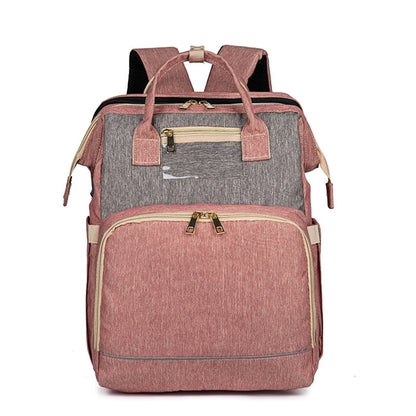Convertible baby-changing backpack with fold-out baby bed – waterproof, multi-pocket design