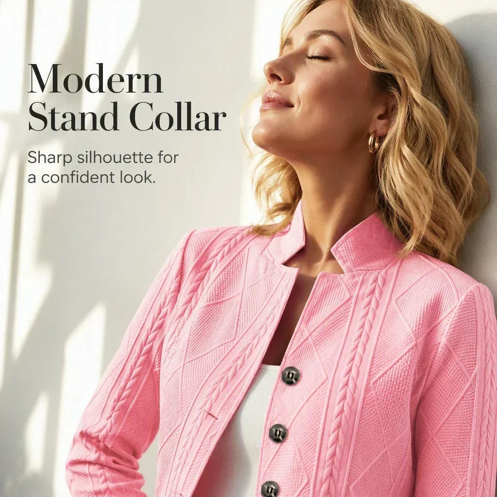 Woman leaning back against a sunlit wall in the pink textured blazer, showing the stand collar and buttons, with a collar feature caption. 19