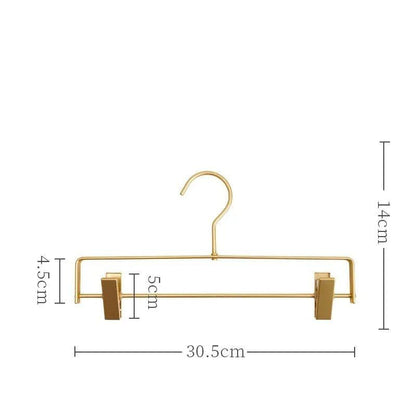 Gold clip hanger with dimension lines marked on a plain background 5