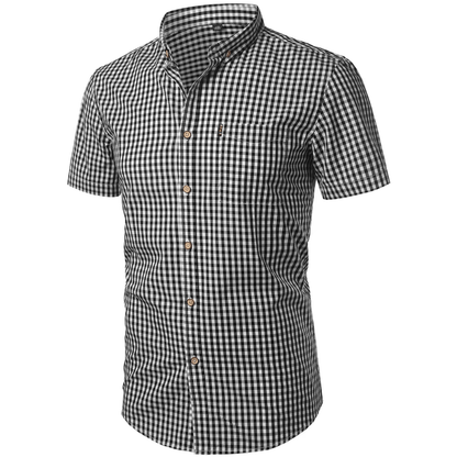 Angled front view of the black and white gingham shirt, showing the buttoned placket and chest pocket. 9